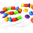 Perles multiformes PLAN TOYS